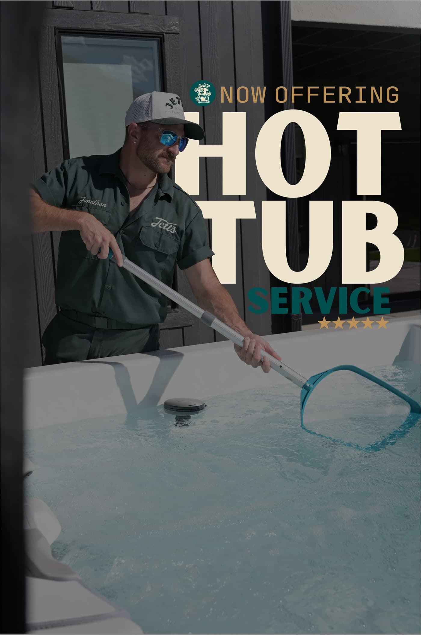 Jett's technician skimming a hot tub. Now offering hot tub service.